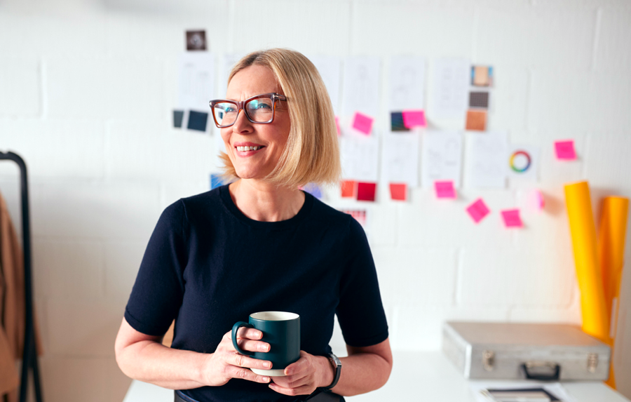 Founder reflecting at a whiteboard